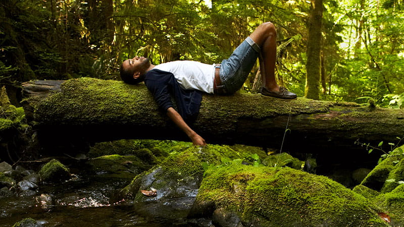 man relaxing in nature